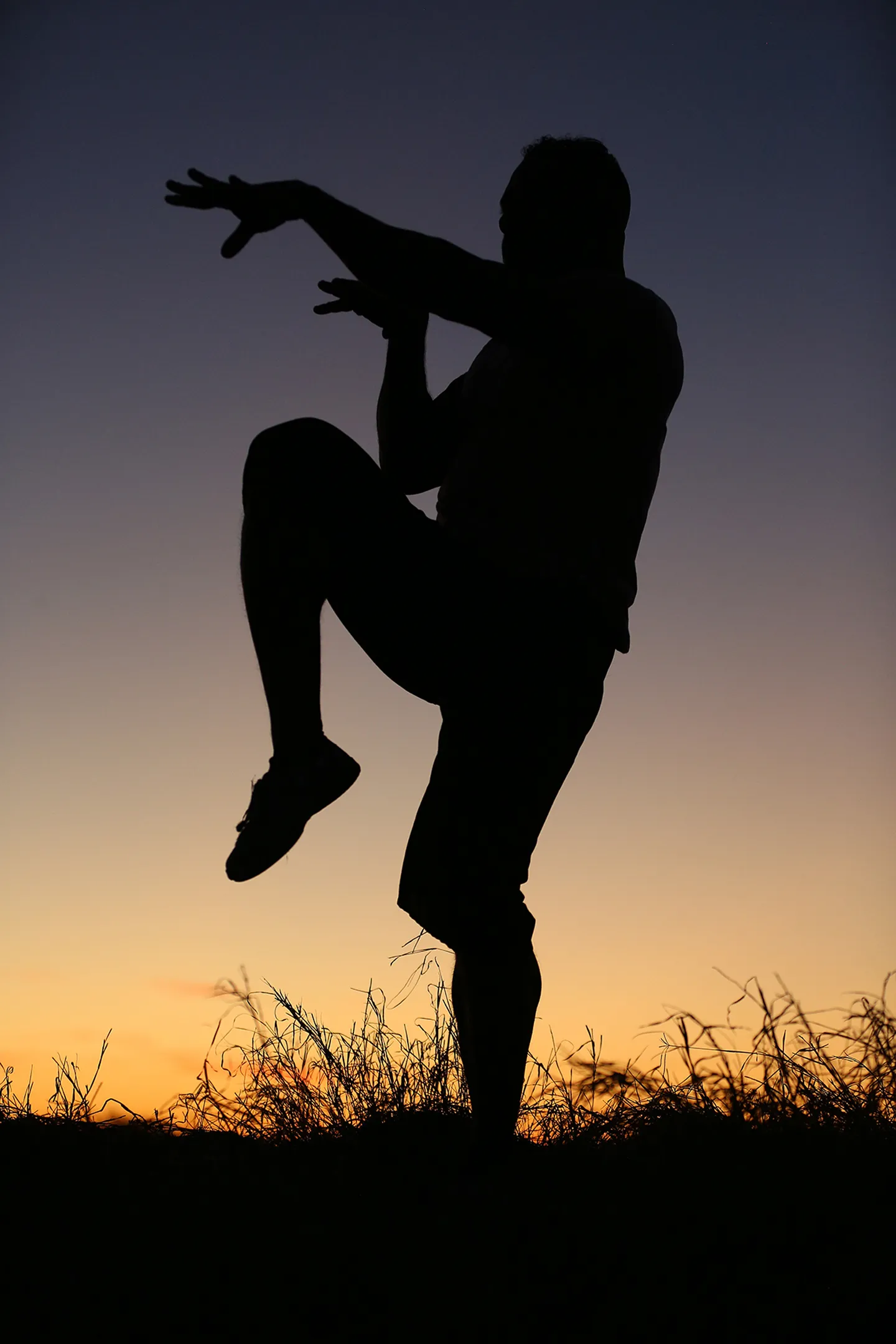 Demaris Parker in a grounded stance, lit by golden desert light